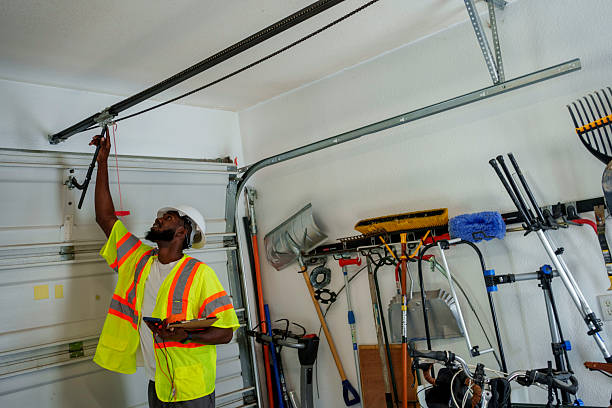 Professional Garage Door Panel Replacement technician working in Cotter, AR